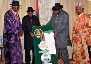 Gov Henry Seriake Dickson presenting a birthday card to President Jonathan on behalf of the government &and people of Bayelsa State.